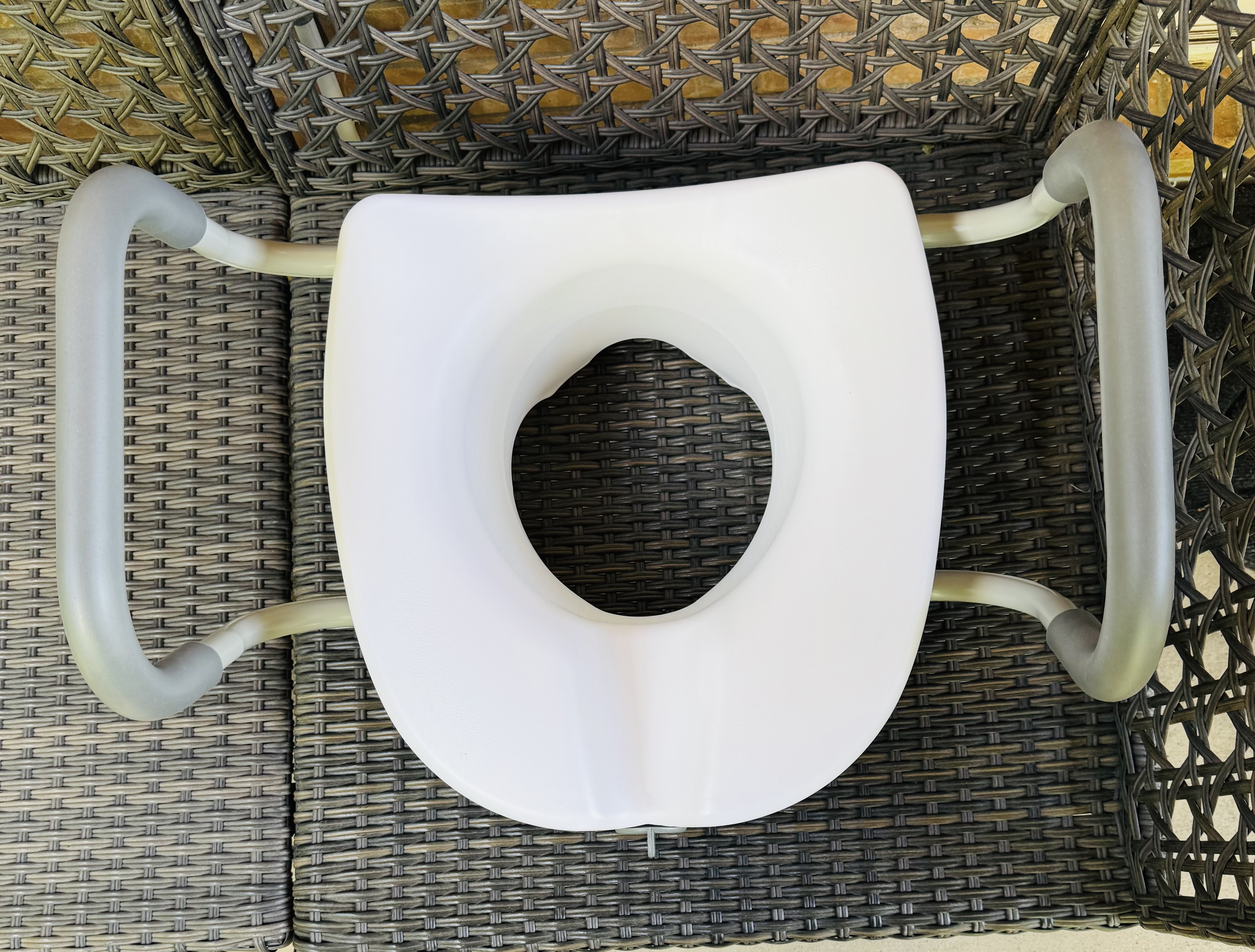 White toilet seat, riser